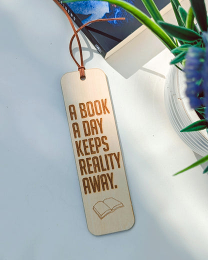 A book a day keeps reality away- Bookmark