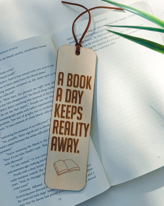 A book a day keeps reality away- Bookmark